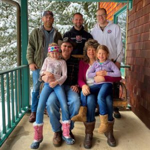 Andrew Shank Bio - Shank Family at the Cabin in the Winter on the Porch